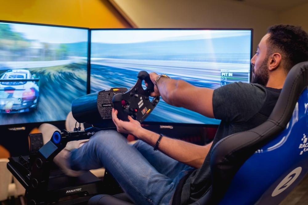Bay La Sun Hotel And Marina - Emaar King Abdullah Economic City Buitenkant foto A racing game player using a steering wheel