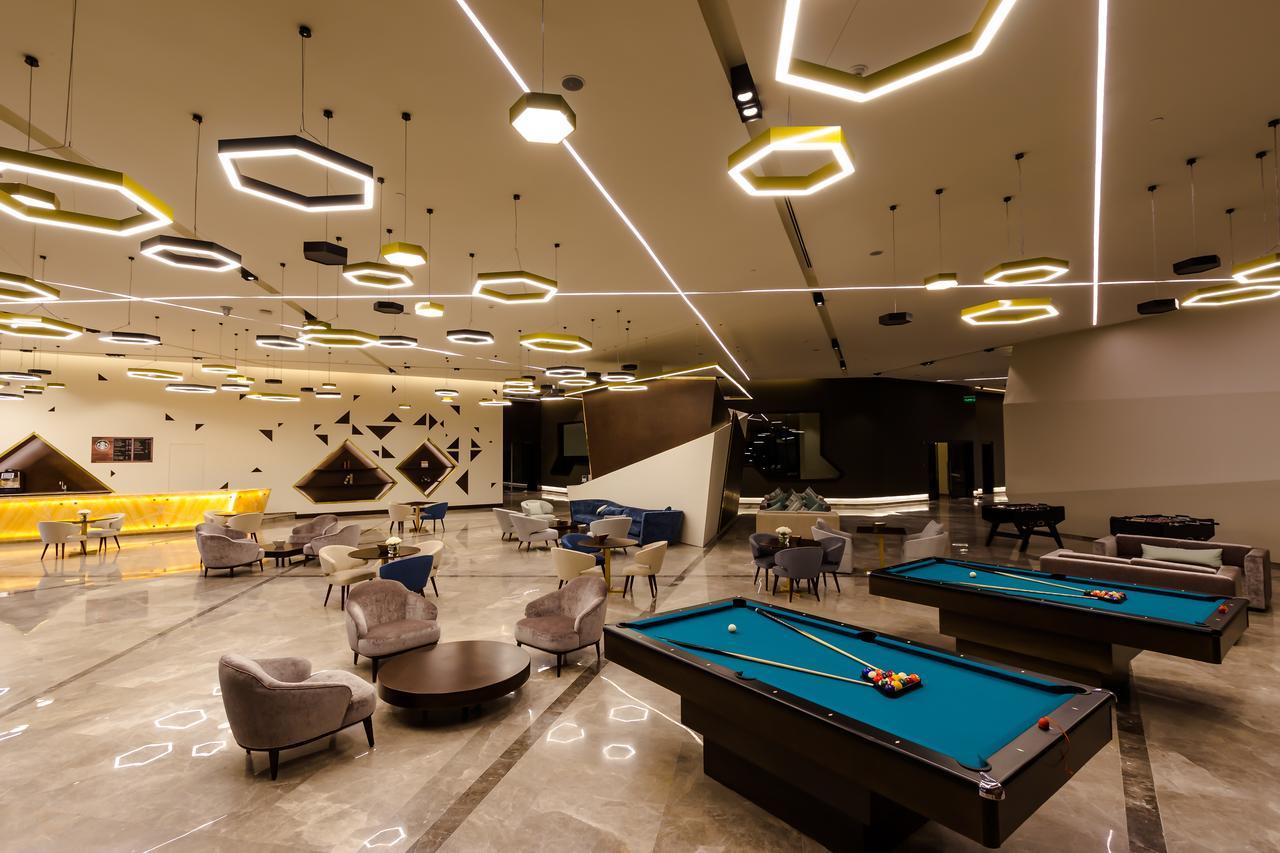 Bay La Sun Hotel And Marina - Emaar King Abdullah Economic City Buitenkant foto The lounge at the airport